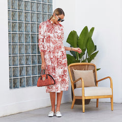 Kleid mit Vintage-Print und gestuftem Saum