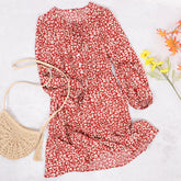 Vestido de manga larga con cuello de lazo y abertura en la boca