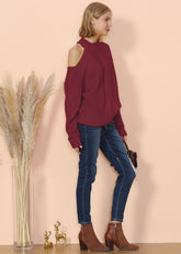 Suéter de punto trenzado con recortes