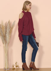 Suéter de punto trenzado con recortes