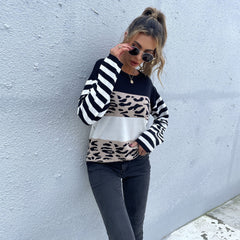 Suéter con estampados mixtos y bloques de color