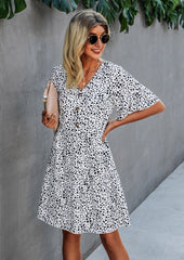 Vestido con estampado animal y botones en contraste