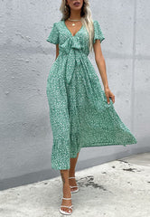 Kleid mit Blumenmuster und Schleife vorne