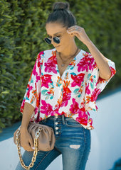 Polo oversize con estampado tropical