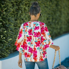 Polo oversize con estampado tropical