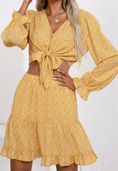 Conjunto de top y falda con lazo floral al frente