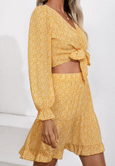 Conjunto de top y falda con lazo floral al frente