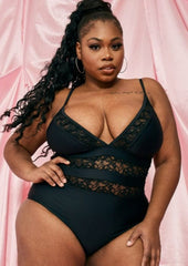 Traje de baño de una pieza con forro de encaje floral y escote pronunciado