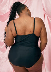 Traje de baño de una pieza con forro de encaje floral y escote pronunciado