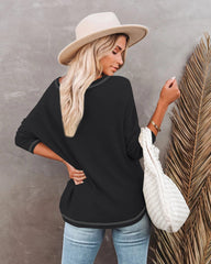 Suéter ligero texturizado con hombros caídos