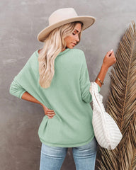 Suéter ligero texturizado con hombros caídos