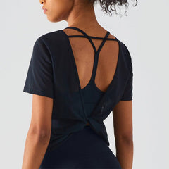 Camisa holgada con espalda abierta y giro