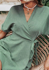 Mono con falda superpuesta y mangas con puños