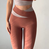 Zweifarbige Leggings mit gekreuzter hoher Taille