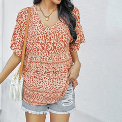 Locker geschnittene Bluse mit gemischtem Print