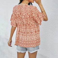 Locker geschnittene Bluse mit gemischtem Print