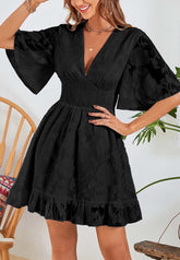 Kleid mit Blumenmuster und geraffter Taille