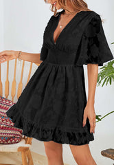 Kleid mit Blumenmuster und geraffter Taille