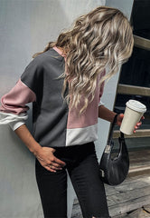 Suéter con bloques de colores geométricos