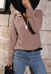 Suéter de punto con cremallera en contraste