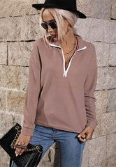 Suéter de punto con cremallera en contraste