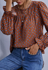 Blusa con estampado de lunares cruzados