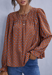 Blusa con estampado de lunares cruzados