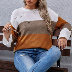 Suéter con bloques de color y detalles desgastados