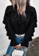 Blusa vintage con detalle de volante y cuello en V