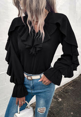 Blusa vintage con detalle de volante y cuello en V