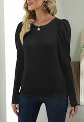 Top con detalle de botones en las mangas Gigot