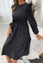 Vestido de lunares con botones en la espalda