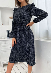 Vestido de lunares con botones en la espalda
