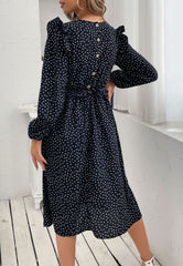 Vestido de lunares con botones en la espalda