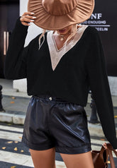 Suéter de punto con detalles de crochet