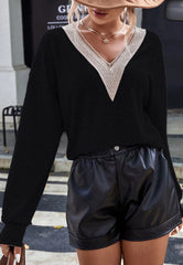 Suéter de punto con detalles de crochet