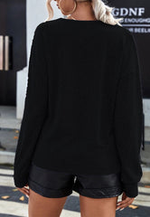 Suéter de punto con detalles de crochet