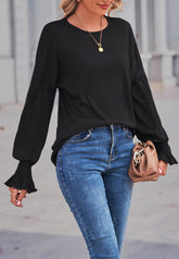 Suéter con puños fruncidos de color liso