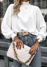 Top de manga larga con cuello alto