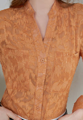 Blusa túnica con botones de encaje