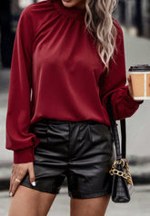 Blusa de color liso con espalda desbocada