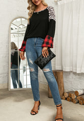 Suéter de cuello redondo con estampado múltiple