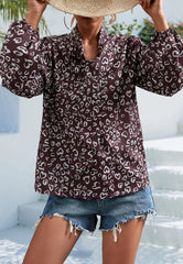 Blusa con mangas de obispo y cuello anudado