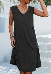 Vestido de color liso con pliegues laterales