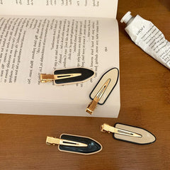 Pinza para el pelo pequeña y sencilla de dos tonos