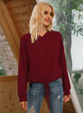 Sudadera con capucha y lazo fruncido en el dobladillo