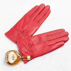 Guantes de piel de oveja para otoño e invierno para mujer, con lazo rojo frío, cálidos y de terciopelo.