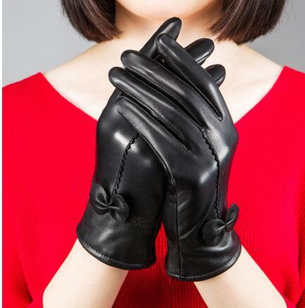 Guantes de piel de oveja para otoño e invierno para mujer, con lazo rojo frío, cálidos y de terciopelo.