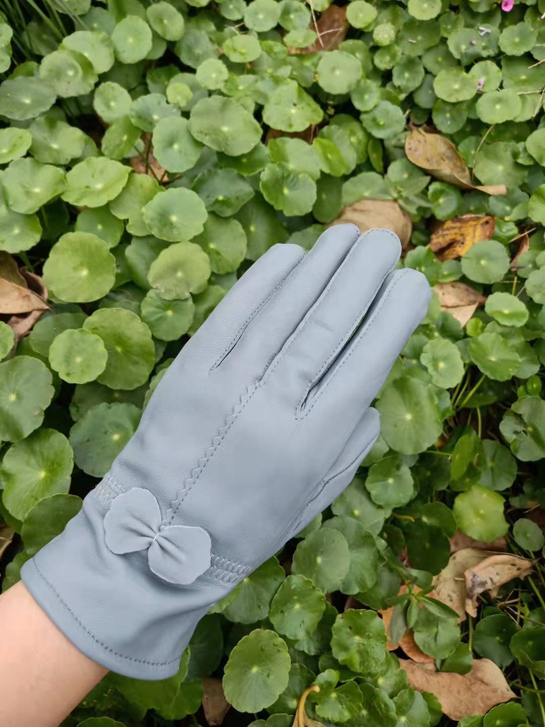 Guantes de piel de oveja para otoño e invierno para mujer, con lazo rojo frío, cálidos y de terciopelo.