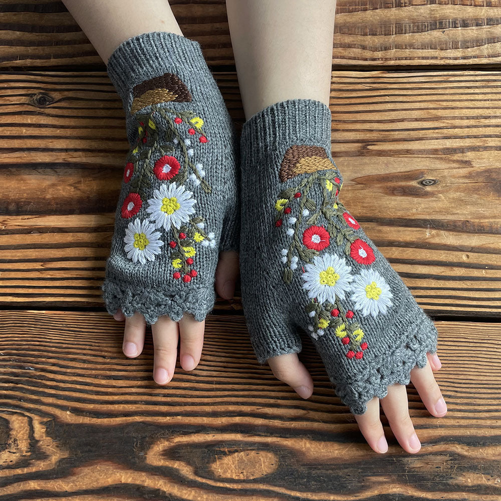 Guantes de punto largos y cálidos con pequeñas flores rojas en maceta